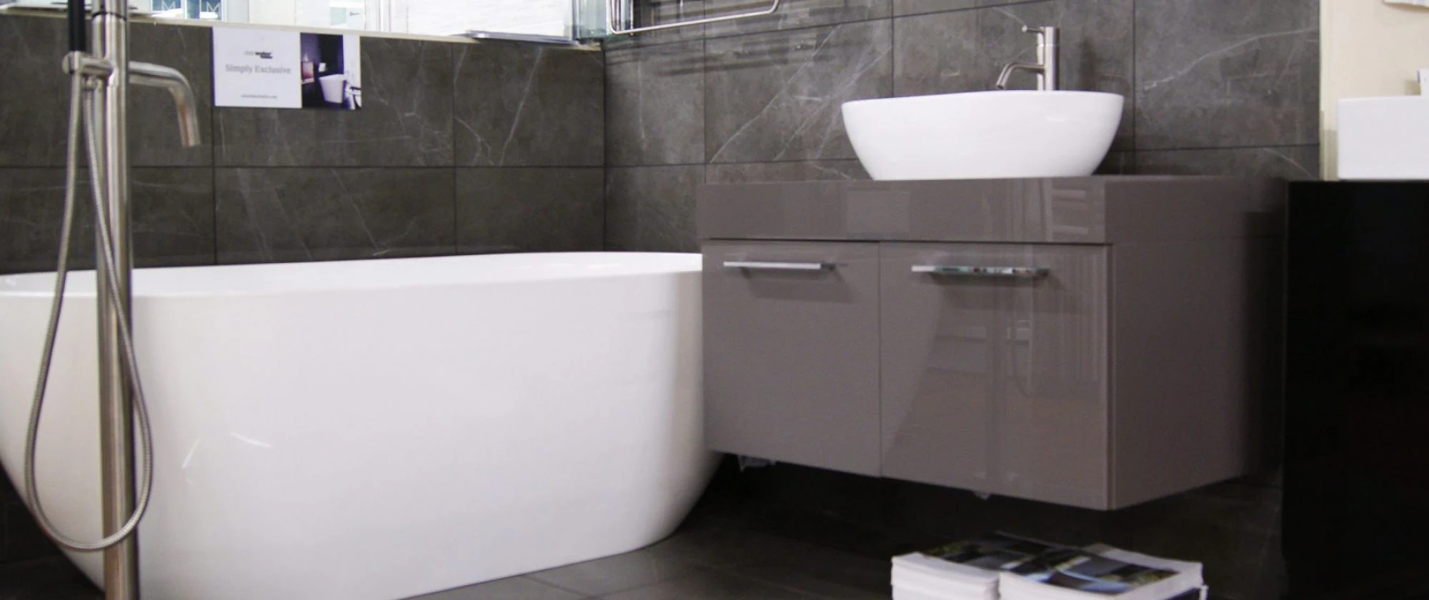 stylish grey bathroom in showroom